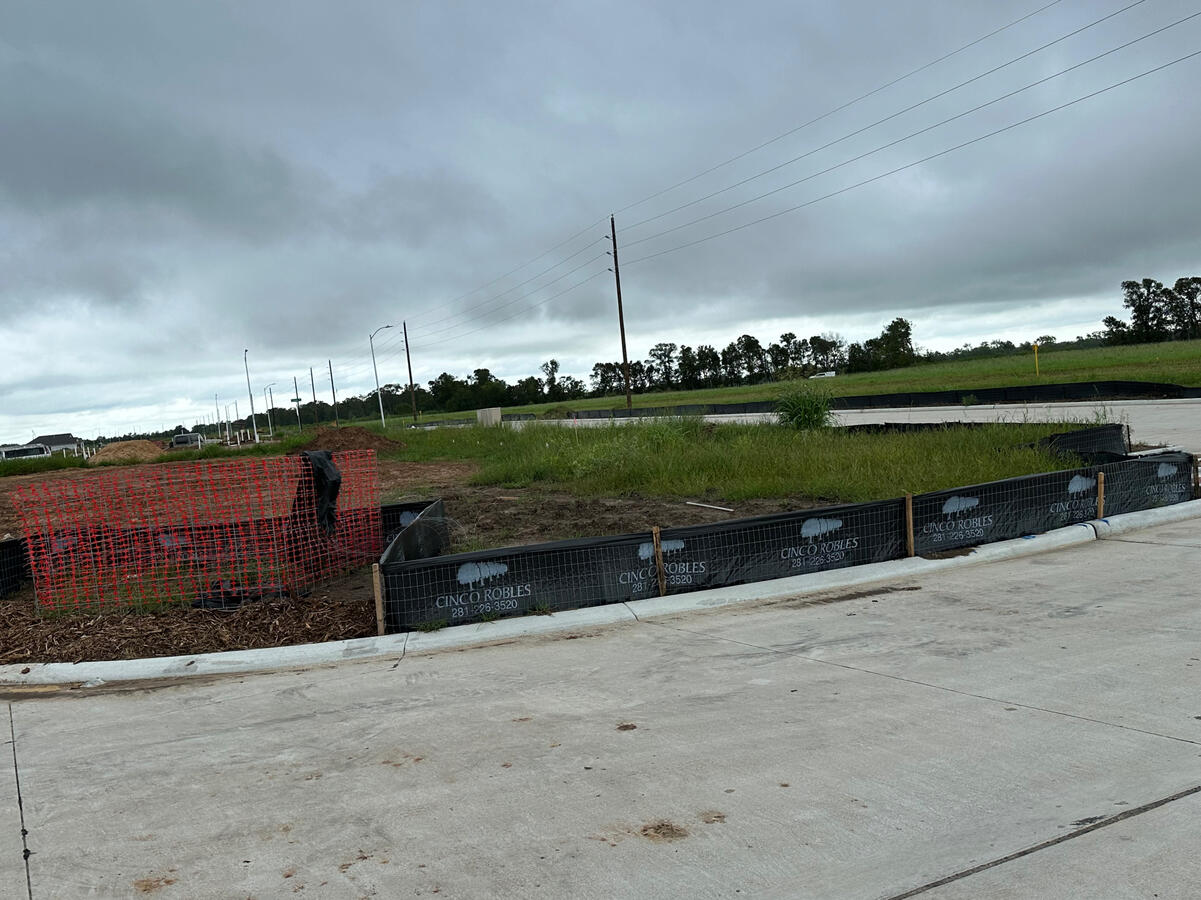 silt fence and trash bin silt fence and trash bin